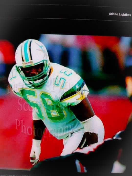 Randy Thornton in football uniform during game action